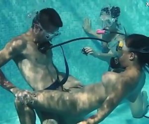 https://www.foxytubes.com/videos/52938428-candy-mike-and-lizzy-super-hot-underwater-threesome.html